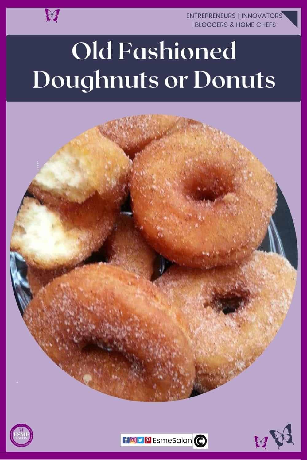 an image of a stack of cinnamon sugar coasted Old Fashioned Doughnuts or Donuts on a glass dish