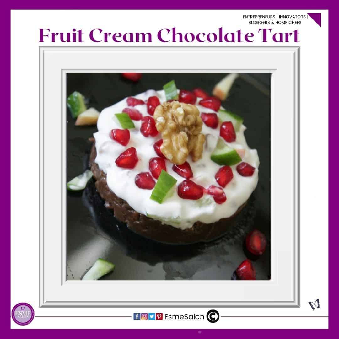 an image of a chocolate tart topped with cream, pomegranate seeds and walnuts.