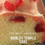 Shirley Temple Cake with studded with Cherries and an icing sugar glaze