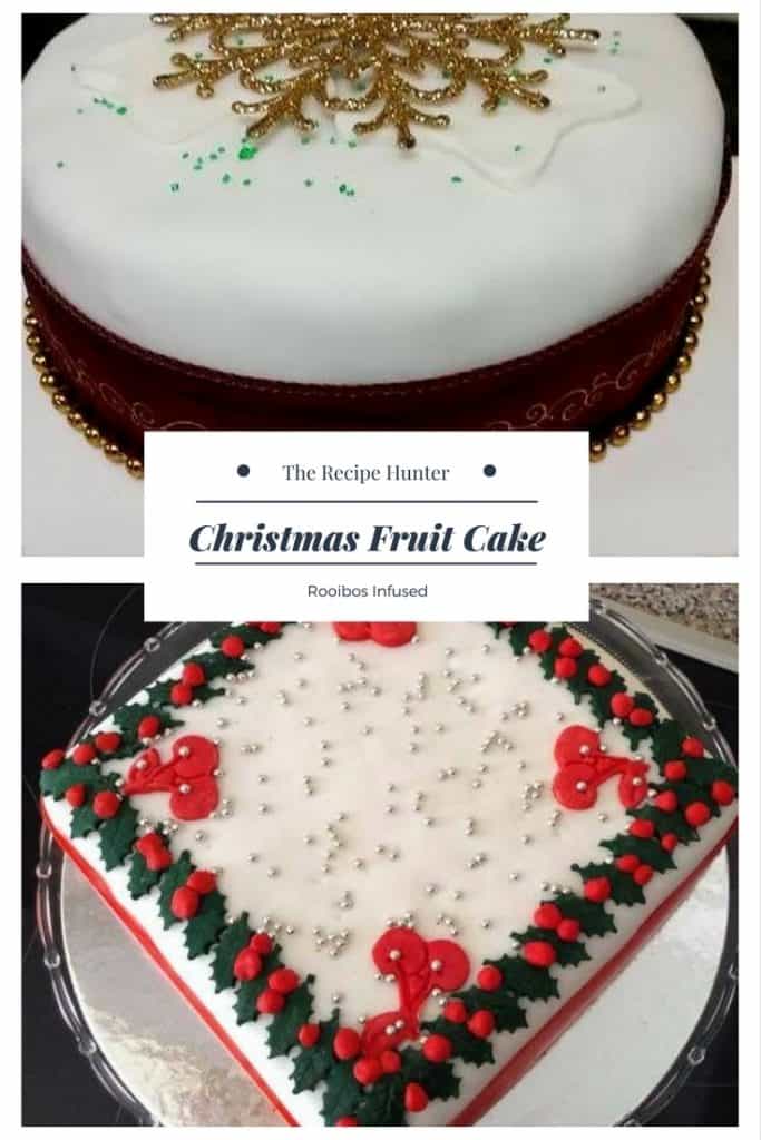 Christmas Fruit Cake top one with white marzipan and a red ribbon at the bottom. The bottom one covered with white marzipan, red cherries and green garland