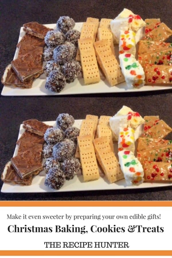 A platter with chocolate and shortbread cookies as well as date balls and red and green nougat