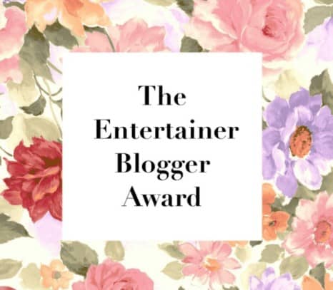 Flower background with the words The Entertainer Blogger Award