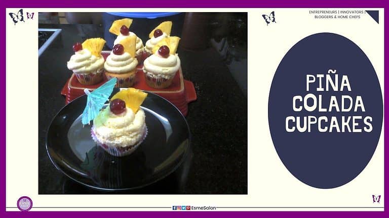 an image of 6 Piña Colada Cupcakes with a red cherry, piece of pineapple and one with a blue paper umbrella