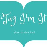 Book-Award logo, a teal open book with verbiage Tag I'm It