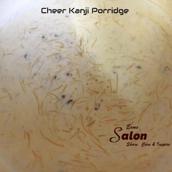 Prepare Ceer Kanji Porridge and break a Coconut