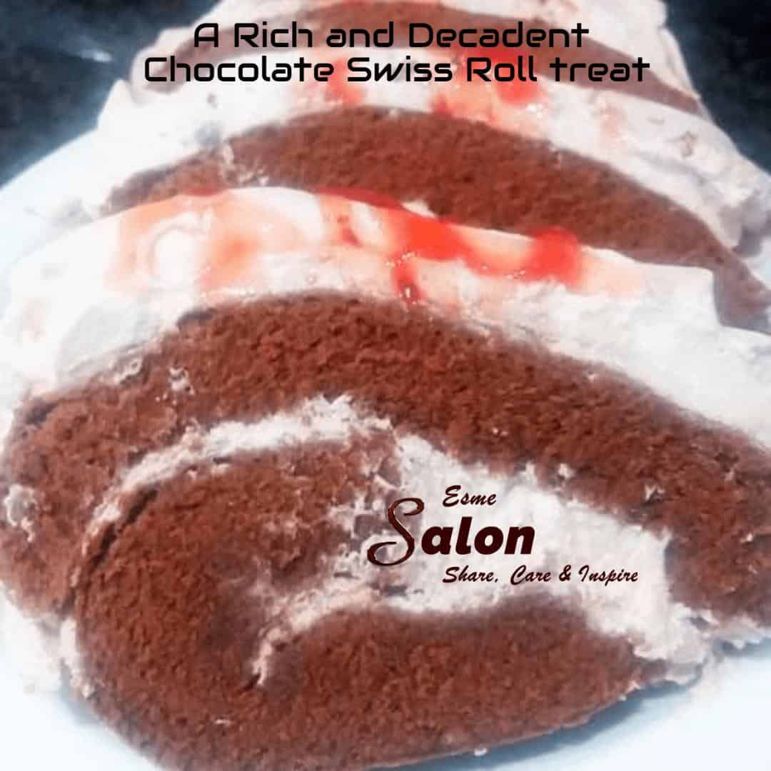 Chocolate Swiss Roll with cream and some jam drizzled over the top