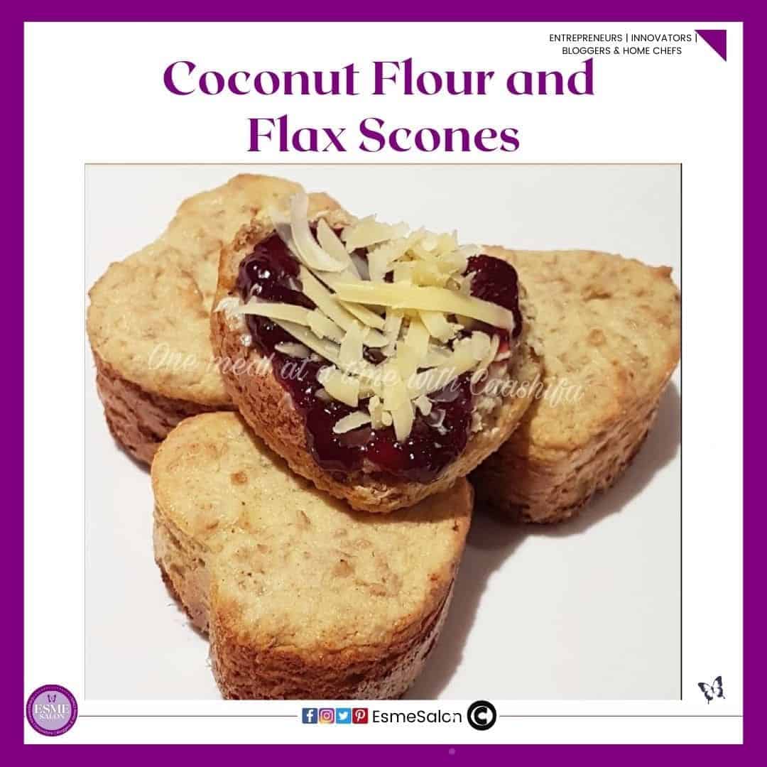 an image of 4 heart shaped Coconut Flour and Flax Scones with jam and shredded cheese