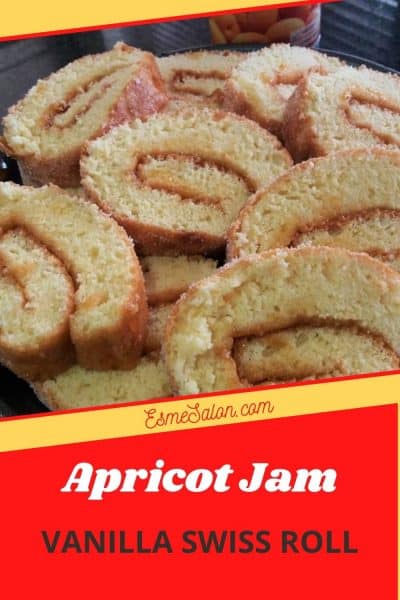 Vanilla Apricot Jam Swiss Roll slices on a glass serving plate