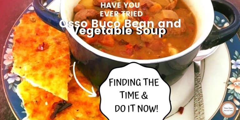 Osso Buco Bean and Vegetable Soup in a black adn white bowl