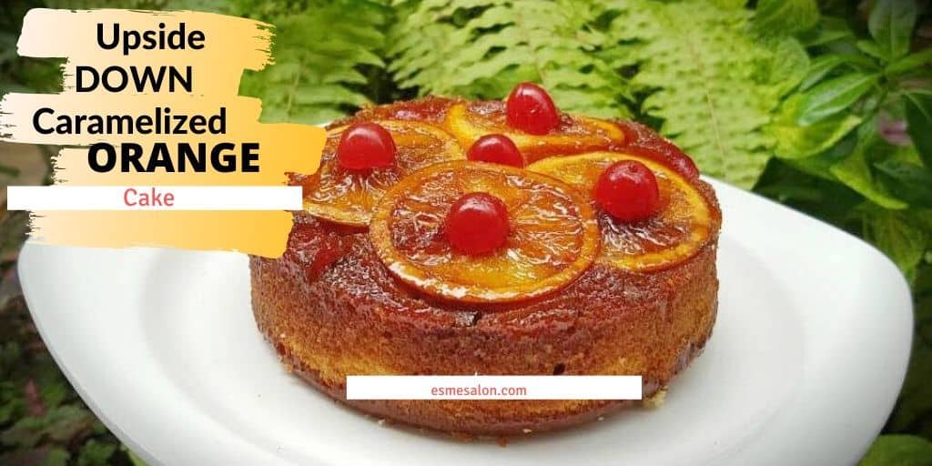 Caramelized Orange Cake with slices of oranges and cherries on the top as decoration