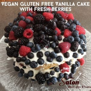 Fresh berries on top of a Vegan Gluten Free Vanilla cake