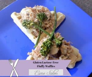 Two quarters of Waffles topped with Pulled pork and Broccoli spears