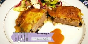 Beef Wellington with salad and gravy