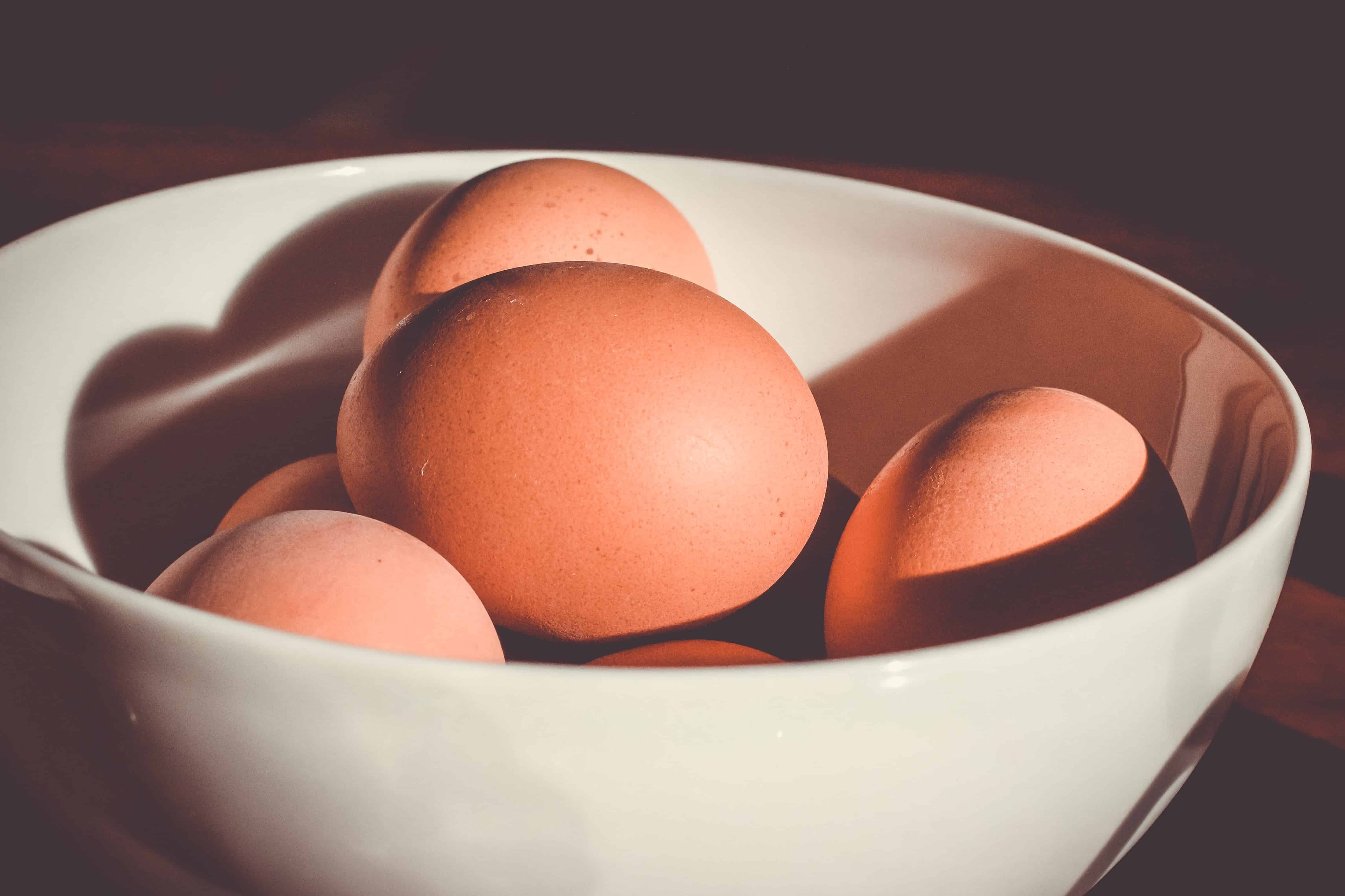 Raw eggs in a bowl