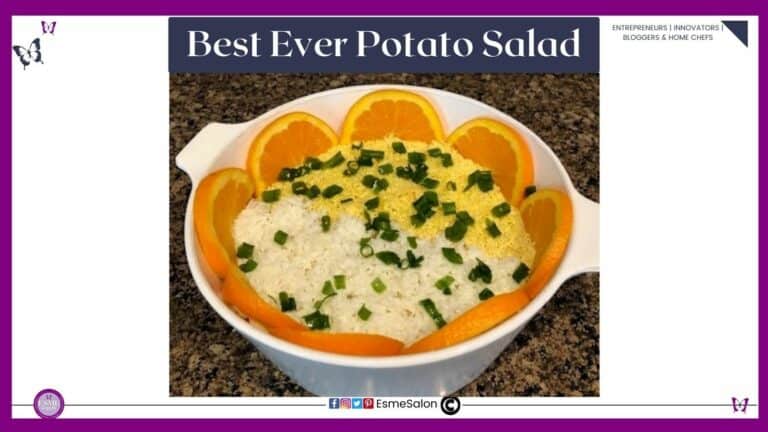 an image of a deep white dish with Potato Salad and decorated with some orange slices around the side of the bowl and grated egg yellow on one side and egg white on the other half.