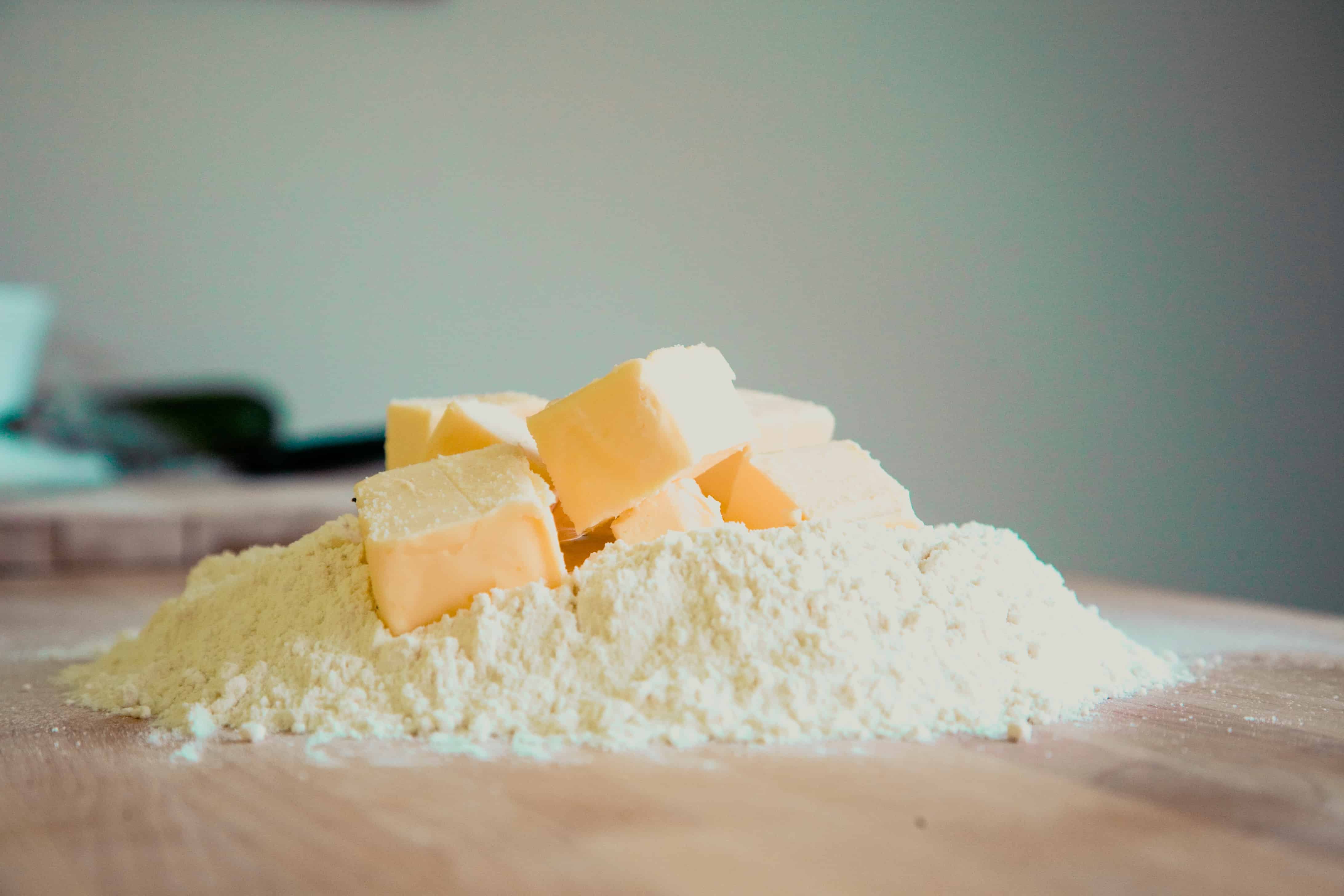 Cubes of butter in flour