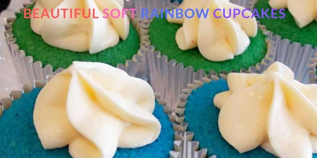 Green and blue Soft Rainbow Cupcakes with white frosting