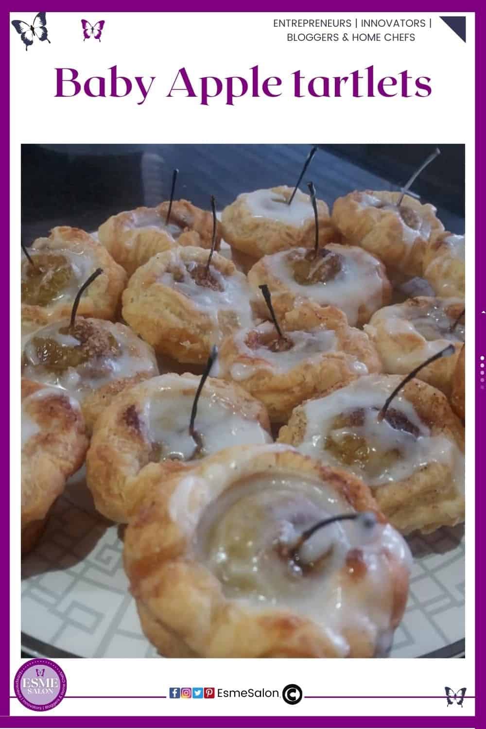an image of small tartlets with single small baby apples and icing drizzled over the apple