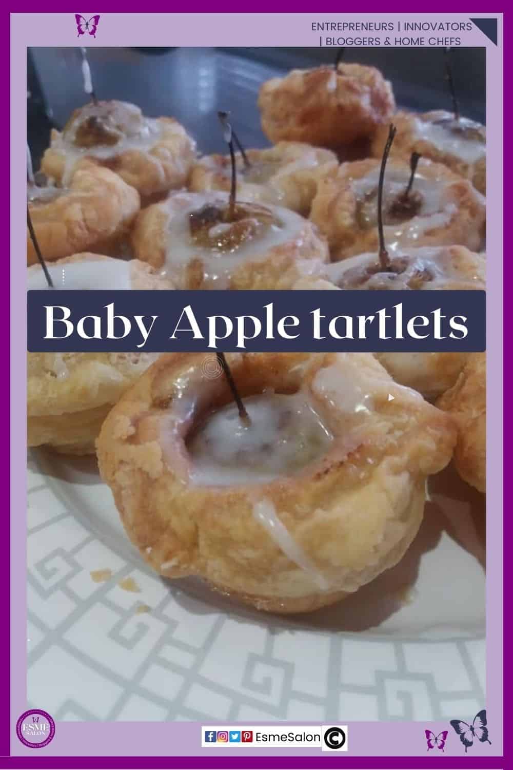an image of small tartlets with single small baby apples and icing drizzled over the apple