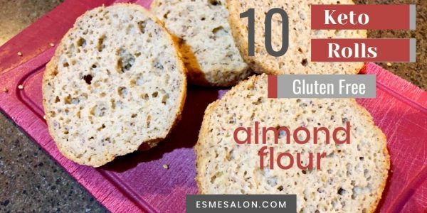 Gluten-Free almond flour keto rolls sliced and sitting on a red cutting board
