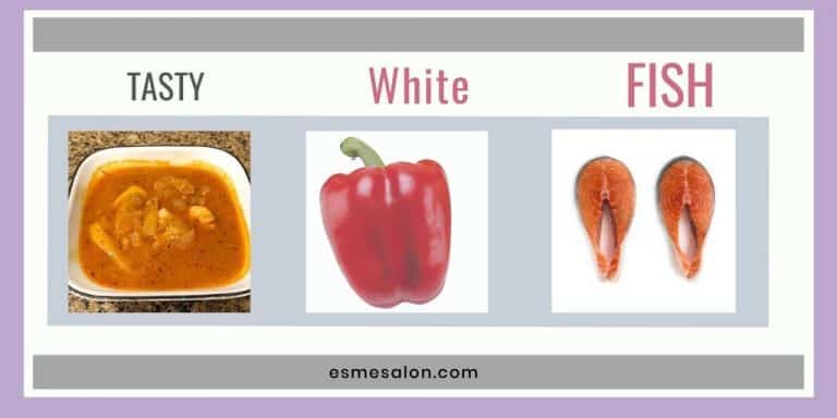 white fish in a rich tomato sauce served in a white square dish as well as a red pepper