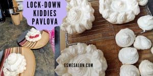 Pavlova on wooden table and also served with some fruit and chantilly cream