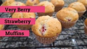 Strawberry Muffins in cupcake paper holders on cooling rack