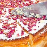 Baked German cheese cake with colored kernels as decoration