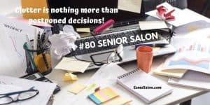 A desk full of clutter and no space to work