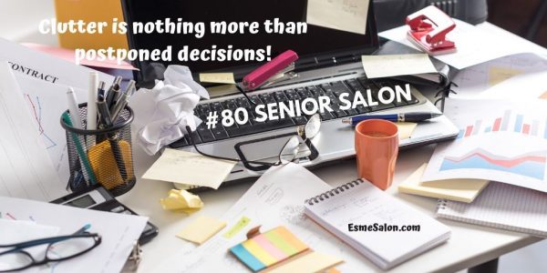 A desk full of clutter and no space to work