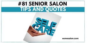 A white book with blue written self care held in the palm of a hand