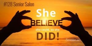 Two hands holding the word "believe", She believed she could so she did!