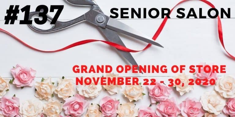 pink and cream roses and a scissor cutting a red ribbon