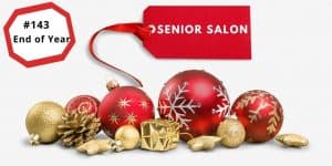 Christmas balls in red and gold with a gold wrapped gift