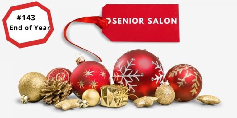 Christmas balls in red and gold with a gold wrapped gift