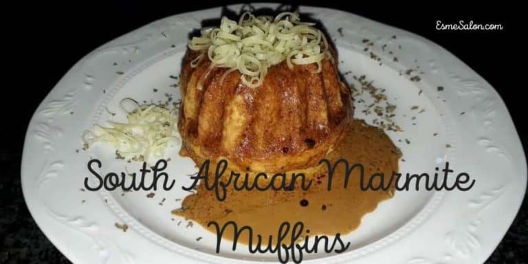 South African Marmite Muffin with grated cheese on a white plate