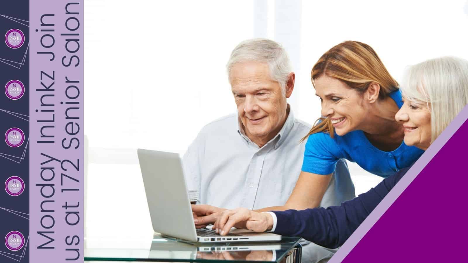 Grey haired man and women and a brown haired daughter working on open laptop