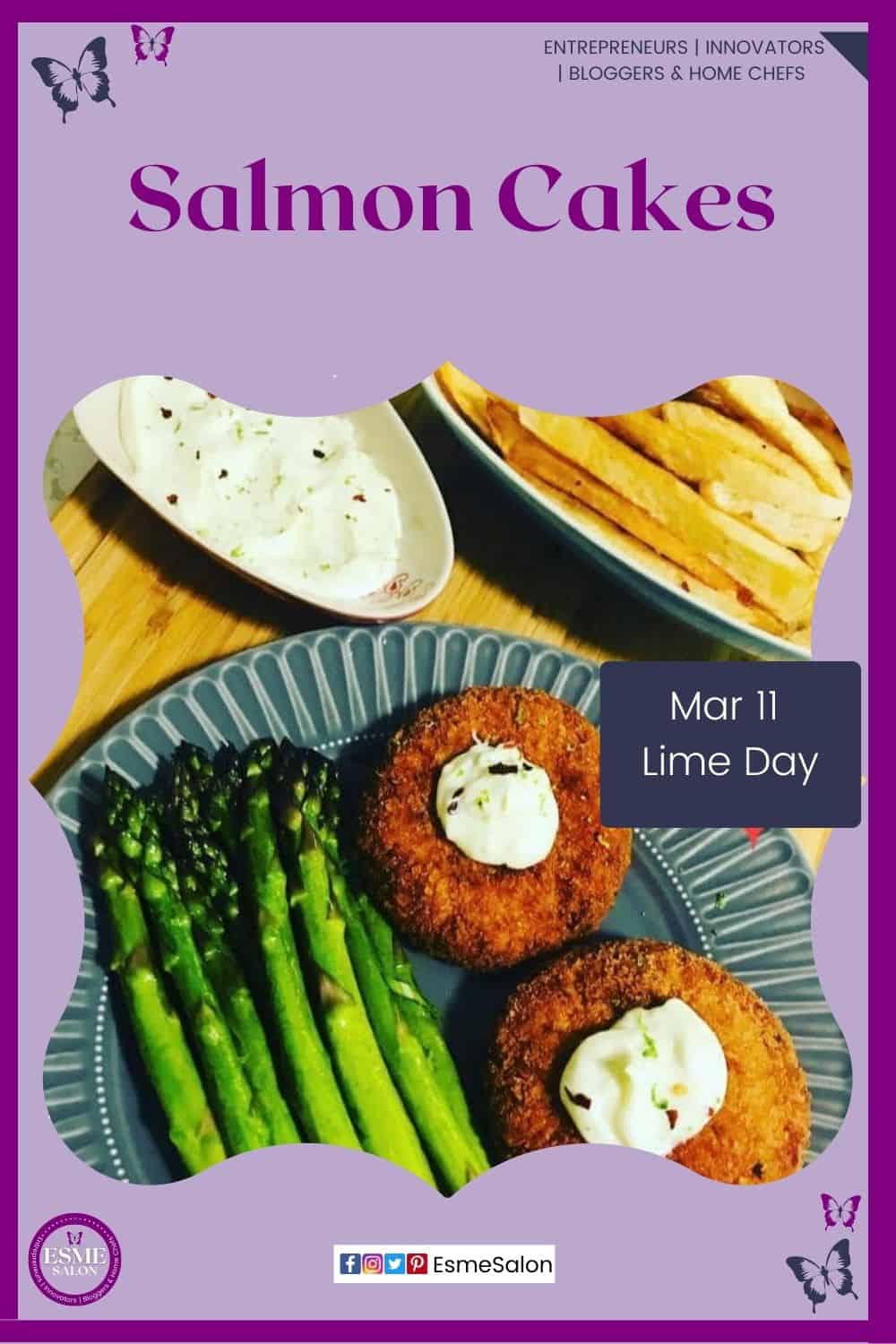 an image of 2 Whole Salmon Fillet Cakes on a plate with asparagus spears and Chili Lime Mayo on the side