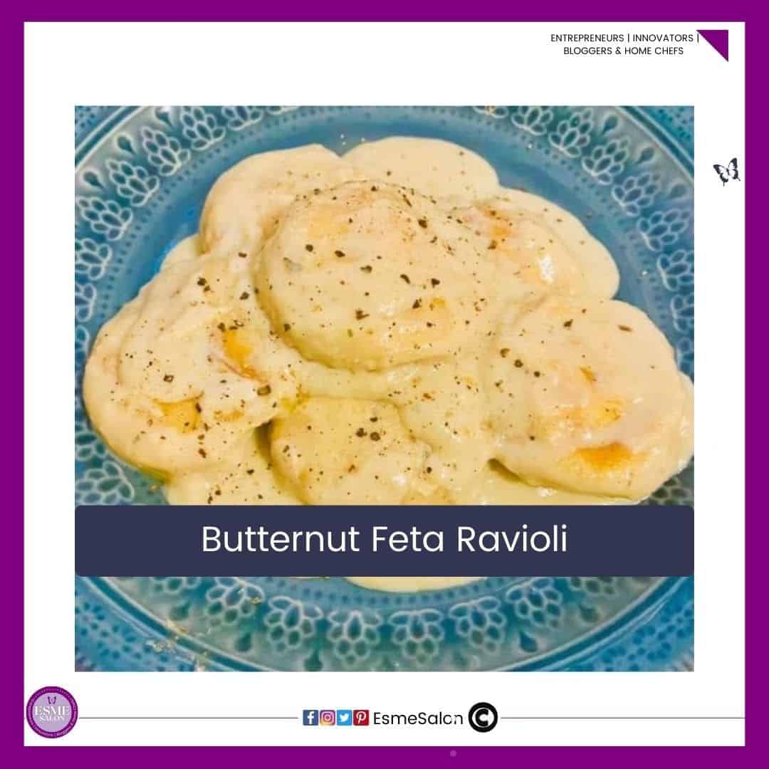 an image of a blue dinner plate filled with Butternut Feta Ravioli served with a brown butter cream sauce