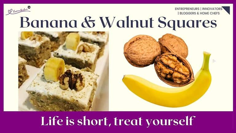an image of a white platter filled with Banana & Walnut Squares with a Ginger Spiced Cream Cheese Frosting cubes