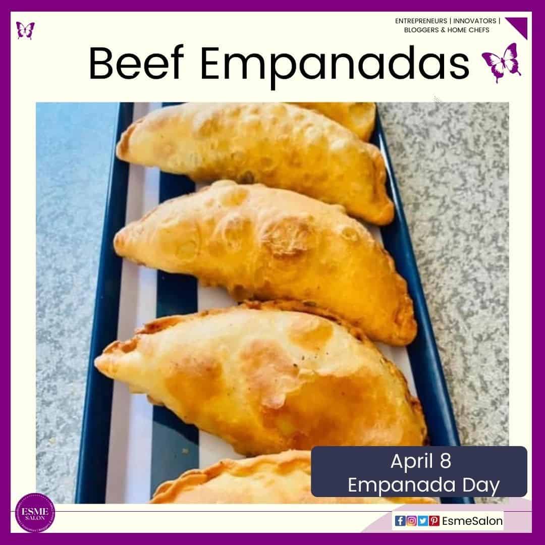 an image of half moon baked Beef Empanadas on a platter