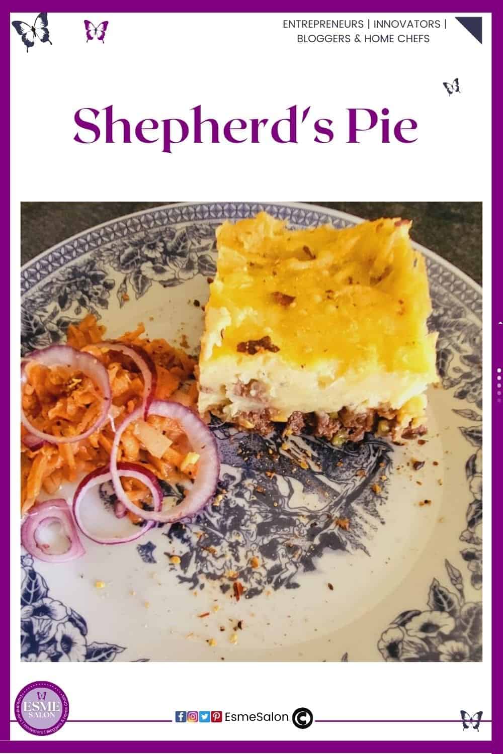 an image of a blue Delft plate with a block of Shepherd's Pie and a side of salad