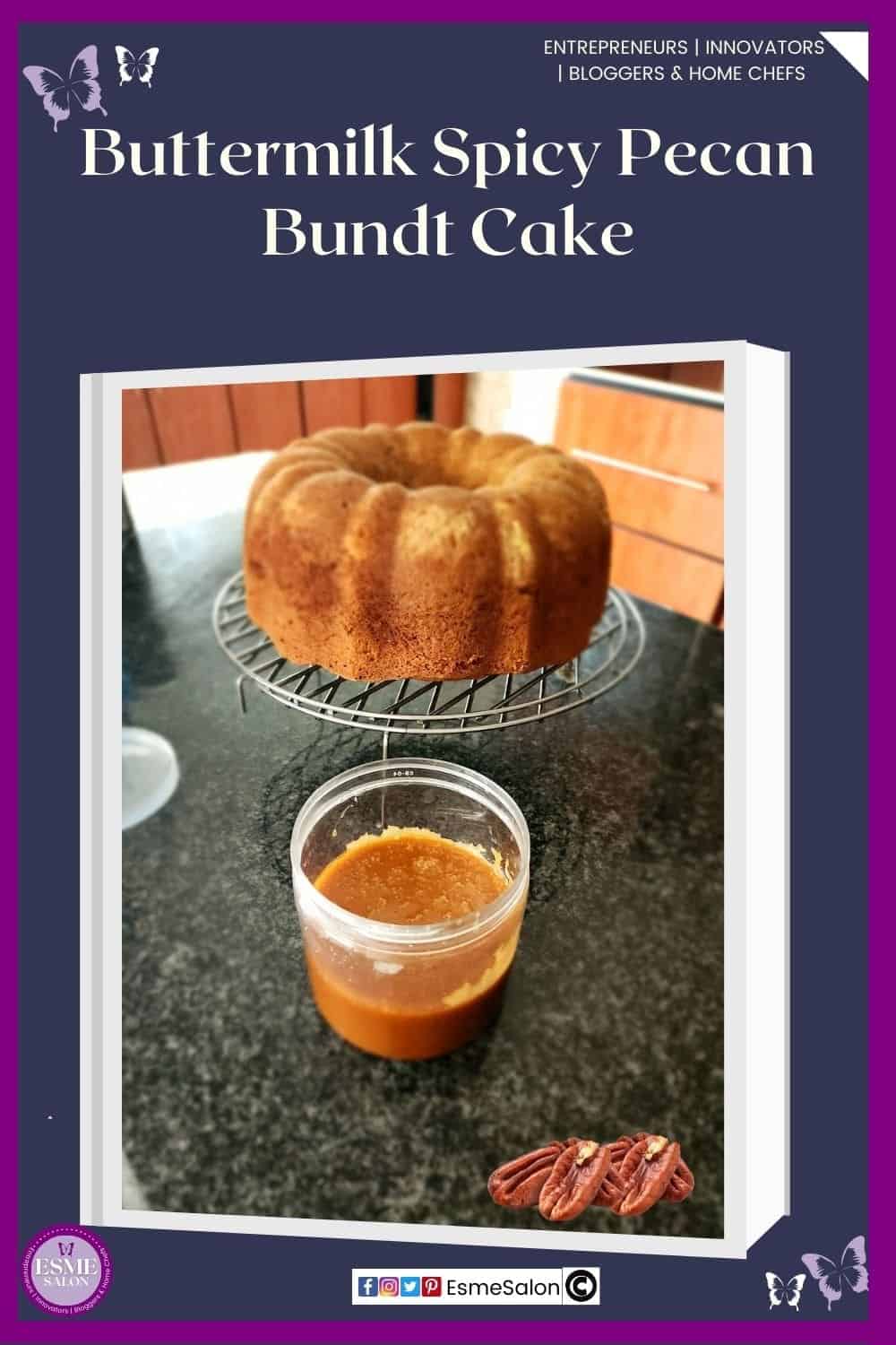 an image of a Buttermilk Spicy Pecan Bundt Cake undecorated with the butterscotch sauce in a glass container still to be added