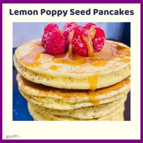 An image of a stack of Lemon Poppy Seed Pancakes with raspberries and syrup
