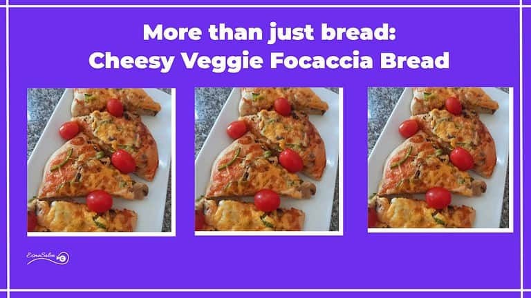 an image of slices cheesy veggie focaccia bread on a white platter with baby tomato as decoration