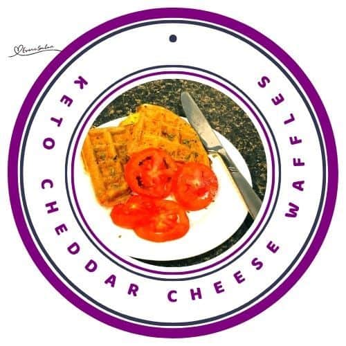 an image of Keto Cheddar Cheese Waffles with Tomatoes on a white plate