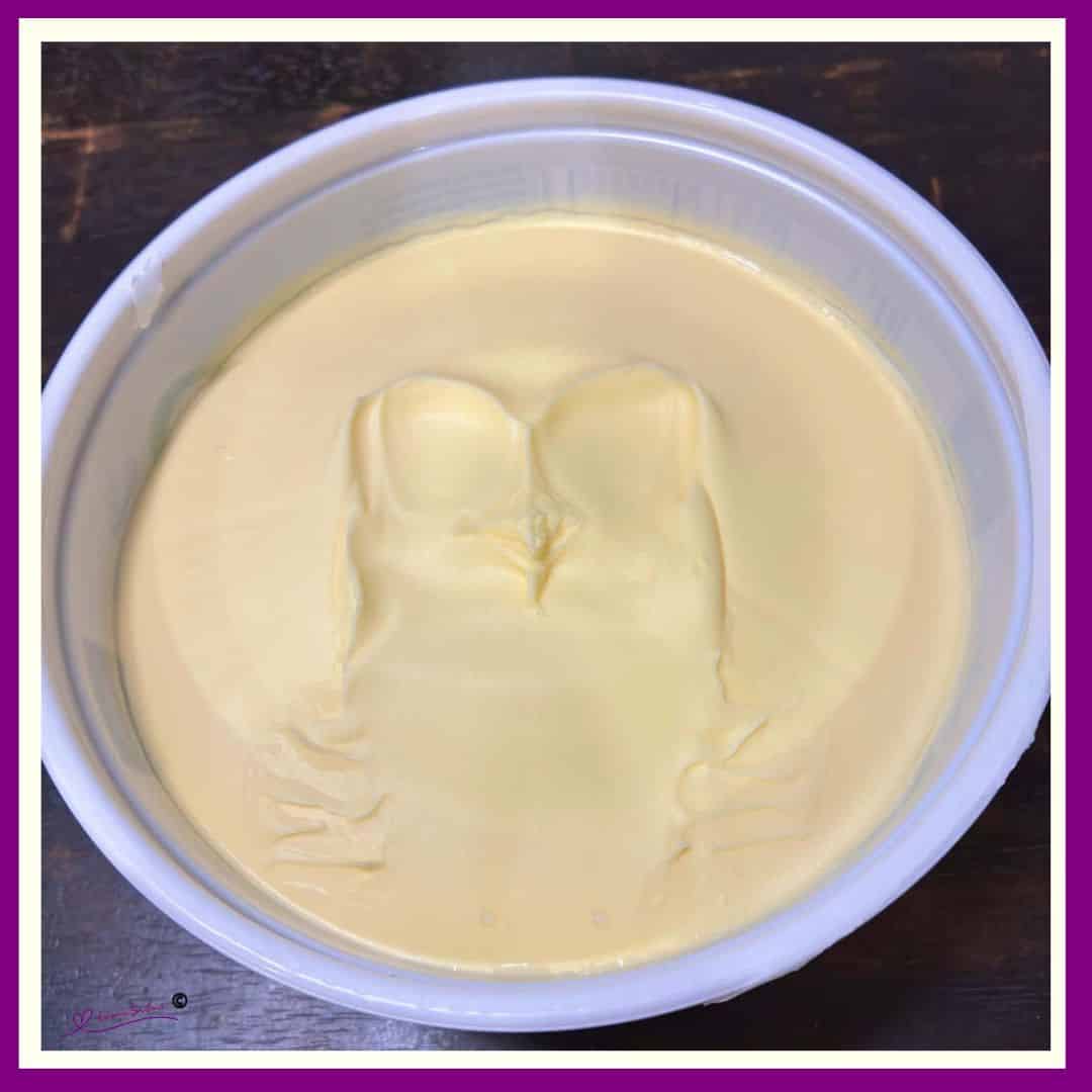 an image of a pattern looking like an owl in butter