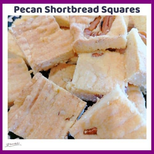 an image of Pecan Shortbread Squares studded with a pecan half