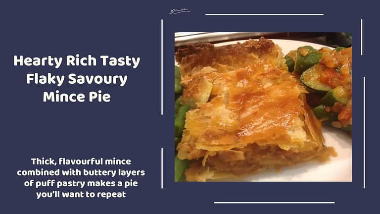 An image of Flaky Savoury Mince Pie with veggies on the side