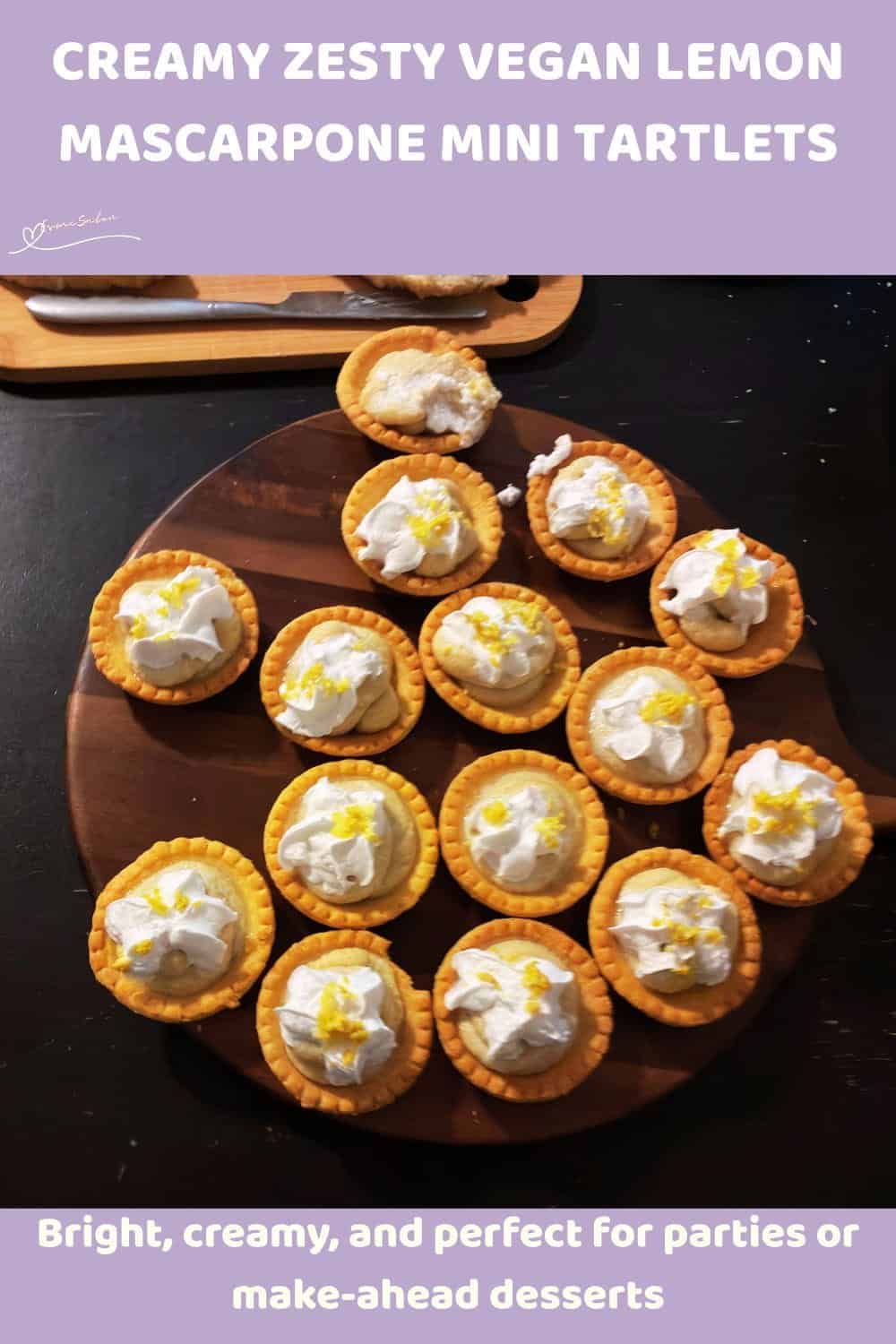 An image of Vegan Lemon Mascarpone Mini Tartlets with grated lemon rind